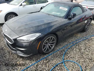 2022 BMW Z4 sDrive30i with VIN WBAHF3C04NWX42062, listed as a Copart auction lot 74989854 with 0 mi miles and Salvage Title. Bid and sale history available at carsss.com. Image 1.