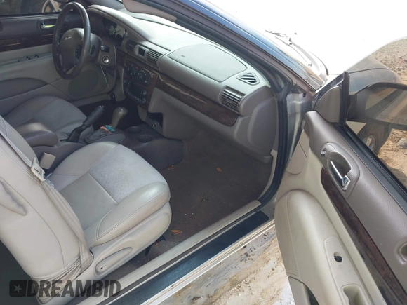 2005 Chrysler Sebring Limited with VIN 1C3EL65R55N705544, listed as a IAAI auction lot 42047691 with 141,136 mi miles and . Bid and sale history available at DreamBid. Image 5.