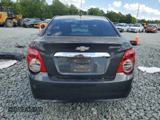 2016 Chevrolet Sonic LT with VIN 1G1JC5SH4G4119418, listed as a Copart auction lot 55809185 with 97,740 mi miles and Salvage title. Bid and sale history available at DreamBid. Image 6.