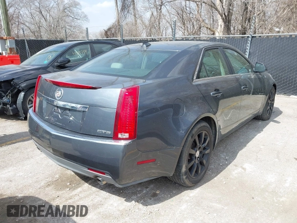 2009 Cadillac CTS RWD z VIN 1G6DF577790133127, wystawiony jako IAAI lot #41810358 z przebiegiem 220 278 mil mil oraz . Historia ofert i sprzedaży dostępna na DreamBid. Obrazek 4.