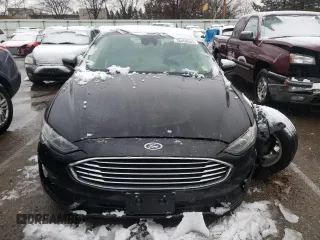 2019 Ford Fusion Hybrid SE with VIN 3FA6P0LU0KR252957, listed as a Copart auction lot 38459553 with 62,947 mi miles. Bid and sale history available at carsss.com. Image 5.