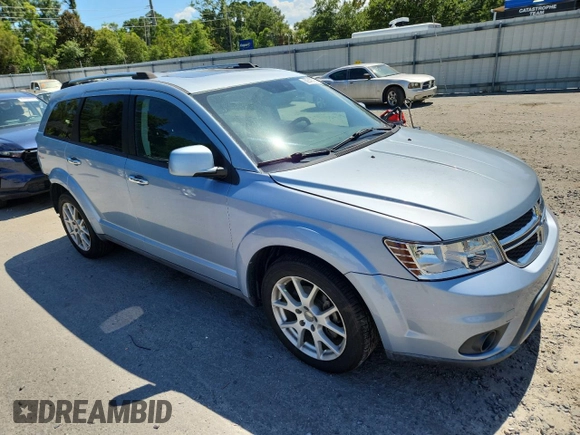2013 Dodge Journey Crew with VIN 3C4PDCDG5DT599840, listed as a Copart auction lot 62542795 with 102,235 mi miles and Salvage title. Bid and sale history available at DreamBid. Image 4.