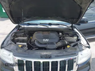 2012 Jeep Grand Cherokee Laredo with VIN 1C4RJEAG2CC259279, listed as a IAAI auction lot 41768024 with 185,161 mi miles. Bid and sale history available at carsss.com. Image 10.