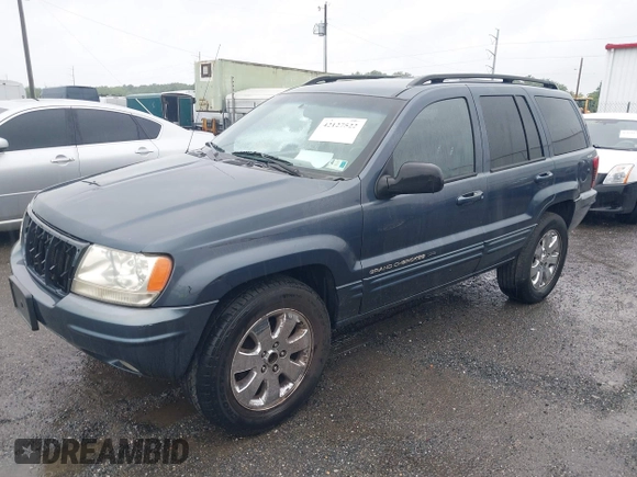 2001 Jeep Grand Cherokee Limited with VIN 1J4GW58S21C673916, listed as a IAAI auction lot 42127522 with Not Provided miles and . Bid and sale history available at DreamBid. Image 2.