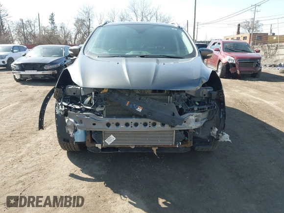 2016 Ford Escape Titanium with VIN 1FMCU9JX5GUA65412, listed as a IAAI auction lot 41859123 with 80,208 mi miles and . Bid and sale history available at DreamBid. Image 12.