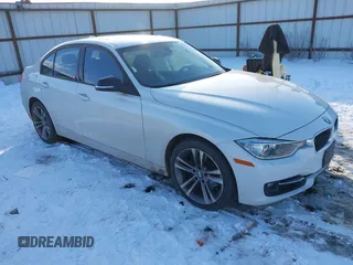 2014 BMW 3 Series 328i xDrive with VIN WBA3B3C55EJ978766, listed as a IAAI auction lot 41535194 with 110,387 mi miles. Bid and sale history available at carsss.com. Image 1.