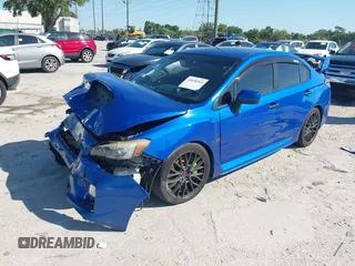 2016 Subaru WRX with VIN JF1VA1B62G9823616, listed as a IAAI auction lot 42028560 with 90,543 mi miles. Bid and sale history available at carsss.com. Image 2.