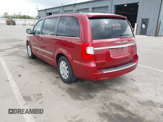 2013 Chrysler Town & Country Touring z VIN 2C4RC1BG2DR777712, wystawiony jako IAAI lot #42114838 z przebiegiem 139 103 mil mil oraz . Historia ofert i sprzedaży dostępna na DreamBid. Obrazek 3.