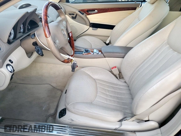 2009 Mercedes-Benz SL 550 z VIN WDBSK71F69F142599, wystawiony jako Copart lot #50241095 z przebiegiem 58 416 mil mil oraz Szkoda całkowita • Salvage title. Historia ofert i sprzedaży dostępna na DreamBid. Obrazek 7.