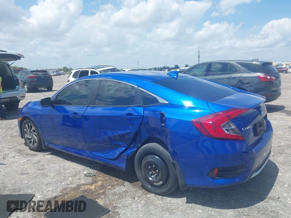 2018 Honda Civic EX with VIN 19XFC2F72JE036055, listed as a IAAI auction lot 41960037 with 128,650 mi miles and . Bid and sale history available at DreamBid. Image 6.