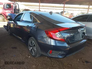 2017 Honda Civic Sedan EX-T with VIN 19XFC1F31HE025632, listed as a IAAI auction lot 41499936 with 71,118 mi miles. Bid and sale history available at carsss.com. Image 3.