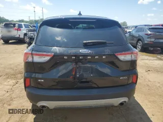 2022 Ford Escape SE z VIN 1FMCU9G67NUB69346, wystawiony jako Copart lot #63013015 z przebiegiem Nie podano mil oraz Czysty tytuł • Clean title. Historia ofert i sprzedaży dostępna na DreamBid. Obrazek 6.