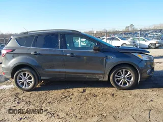 2018 Ford Escape SE with VIN 1FMCU0GD0JUA87303, listed as a IAAI auction lot 41612502 with 70,233 mi miles. Bid and sale history available at carsss.com. Image 14.