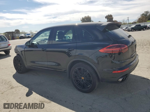 2017 Porsche Cayenne Turbo with VIN WP1AC2A2XHLA92055, listed as a Copart auction lot 52610555 with 82,224 mi miles and Salvage title. Bid and sale history available at DreamBid. Image 2.