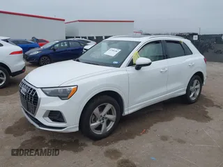 2021 Audi Q3 Premium with VIN WA1AUCF35M1089733, listed as a IAAI auction lot 41506186 with 69,211 mi miles and . Bid and sale history available at DreamBid. Image 2.