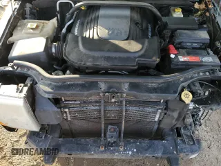 2010 Jeep Commander Limited with VIN 1J4RG5GT6AC113462, listed as a Copart auction lot 82400044 with 189,168 mi miles and Salvage title. Bid and sale history available at DreamBid. Image 13.