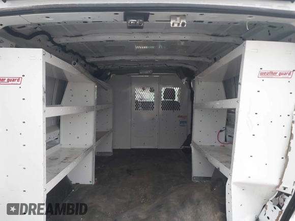 2023 Ford Transit Cargo with VIN 1FTYE1Y82PKB92413, listed as a IAAI auction lot 41702808 with 20,144 mi miles and . Bid and sale history available at DreamBid. Image 8.