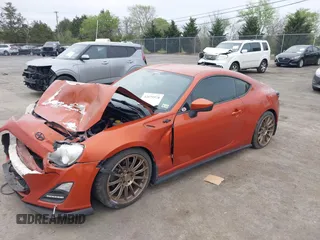 2014 Scion FR-S z VIN JF1ZNAA16E9703911, wystawiony jako IAAI lot #42079578 z przebiegiem 95 754 mil mil oraz . Historia ofert i sprzedaży dostępna na DreamBid. Obrazek 2.