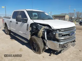 2021 Ford Super Duty F-250 SRW XL with VIN 1FT7W2BT2MEC37128, listed as a IAAI auction lot 41735304 with 103,992 mi miles. Bid and sale history available at carsss.com. Image 1.