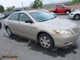 2008 Toyota Camry LE with VIN JTNBK46K583036579, listed as a IAAI auction lot 42077719 with 220,302 mi miles. Bid and sale history available at carsss.com. Image 1.
