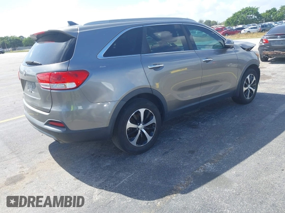 2016 Kia Sorento EX with VIN 5XYPH4A16GG126700, listed as a IAAI auction lot 41557828 with 130,102 mi miles. Bid and sale history available at carsss.com. Image 4.