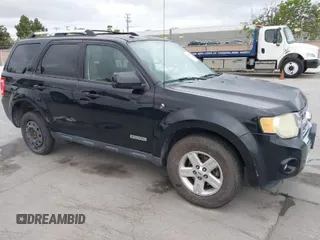 2008 Ford Escape Hybrid with VIN 1FMCU59H68TB26124, listed as a IAAI auction lot 42062917 with 197,929 mi miles. Bid and sale history available at carsss.com. Image 1.