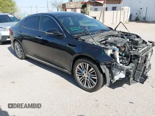 2016 Kia Optima SXL Turbo with VIN 5XXGV4L29GG086468, listed as a IAAI auction lot 41933581 with 186,881 mi miles. Bid and sale history available at carsss.com. Image 1.