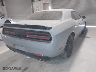 2021 Dodge Challenger GT with VIN 2C3CDZKG6MH642079, listed as a IAAI auction lot 41612713 with 76,863 mi miles. Bid and sale history available at carsss.com. Image 4.