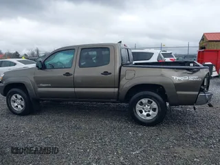 2015 Toyota Tacoma with VIN 3TMLU4EN1FM201554, listed as a IAAI auction lot 42008012 with 118,313 mi miles and . Bid and sale history available at DreamBid. Image 14.
