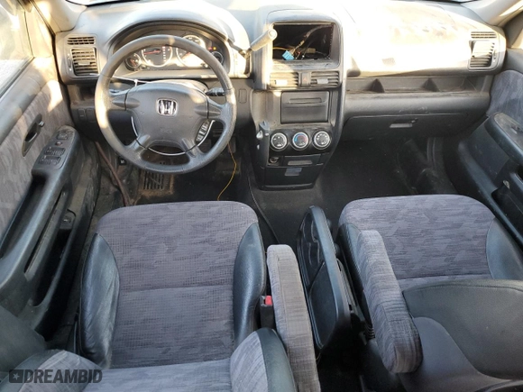 2003 Honda CR-V LX with VIN SHSRD78563U130786, listed as a Copart auction lot 77021604 with 208,065 mi miles and Salvage Title. Bid and sale history available at carsss.com. Image 8.