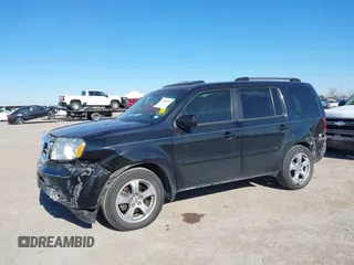 2014 Honda Pilot EX-L with VIN 5FNYF3H59EB028231, listed as a IAAI auction lot 41335724 with 112,614 mi miles. Bid and sale history available at carsss.com. Image 6.