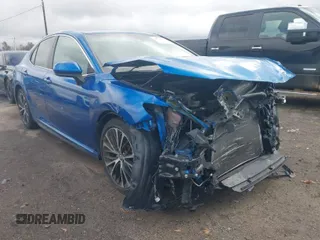 2018 Toyota Camry LE z VIN 4T1B11HKXJU111484, wystawiony jako IAAI lot #41731184 z przebiegiem 67 338 mil mil oraz . Historia ofert i sprzedaży dostępna na DreamBid. Obrazek 1.