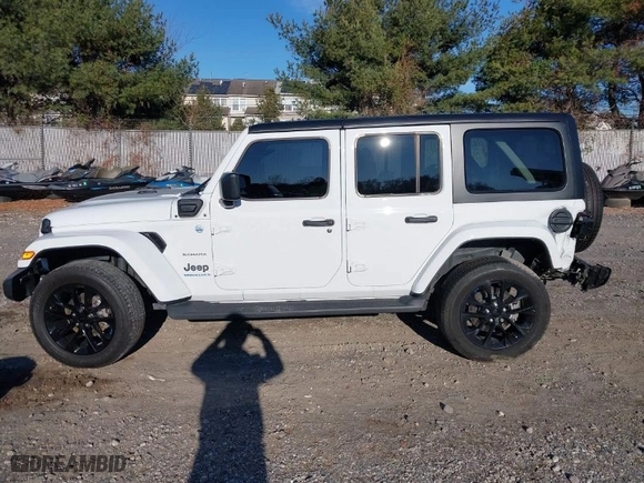 2023 Jeep Wrangler 4xe Sahara with VIN 1C4JJXP61PW684682, listed as a IAAI auction lot 40998281 with 41,138 mi miles. Bid and sale history available at carsss.com. Image 14.