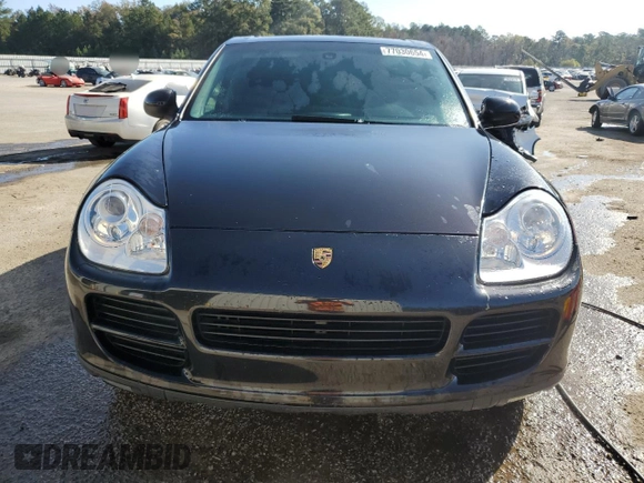 2004 Porsche Cayenne S with VIN WP1AB29P54LA69344, listed as a Copart auction lot 77030654 with 248,249 mi miles and Salvage Title. Bid and sale history available at carsss.com. Image 5.