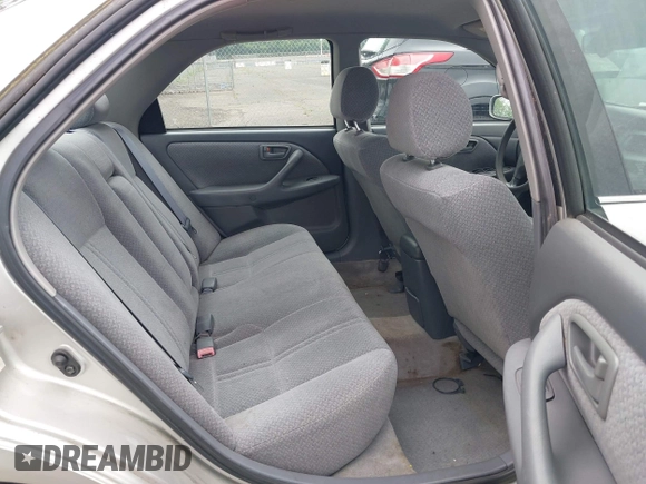 2001 Toyota Camry CE z VIN 4T1BG22K41U847401, wystawiony jako IAAI lot #42275762 z przebiegiem 202 936 mil mil oraz . Historia ofert i sprzedaży dostępna na DreamBid. Obrazek 8.