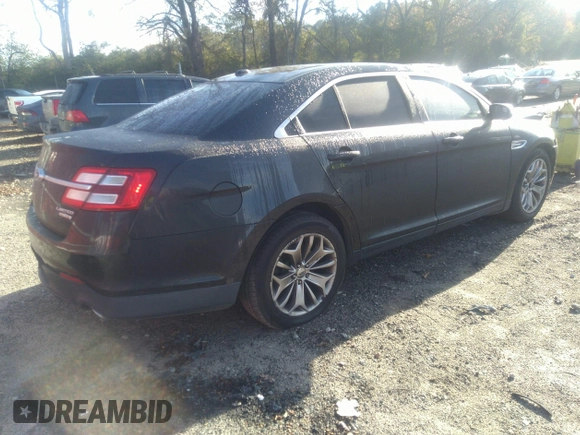 2014 Ford Taurus Limited with VIN 1FAHP2F80EG101504, listed as a IAAI auction lot 40974783 with 177,522 mi miles. Bid and sale history available at carsss.com. Image 4.