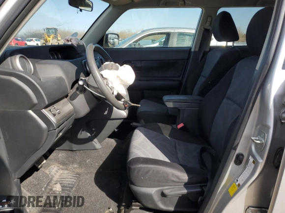 2012 Scion xB with VIN JTLZE4FE1CJ009084, listed as a Copart auction lot 50447785 with 74,155 mi miles and Salvage Title. Bid and sale history available at carsss.com. Image 7.