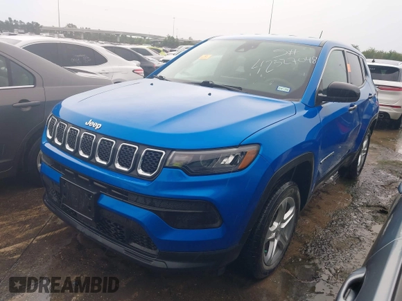2023 Jeep Compass Sport with VIN 3C4NJDAN1PT509922, listed as a IAAI auction lot 42327048 with 26,598 mi miles and . Bid and sale history available at DreamBid. Image 2.