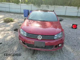 2014 Volkswagen Eos Sport z VIN WVWBW8AH9EV002933, wystawiony jako Copart lot #56212705 z przebiegiem 142 117 mil mil oraz Szkoda całkowita • Salvage title. Historia ofert i sprzedaży dostępna na DreamBid. Obrazek 13.