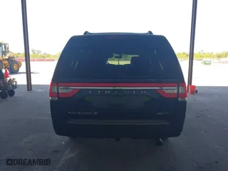 2015 Lincoln Navigator L with VIN 5LMJJ3JT0FEJ12569, listed as a IAAI auction lot 41909517 with 165,631 mi miles. Bid and sale history available at carsss.com. Image 15.