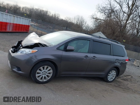 2014 Toyota Sienna LE with VIN 5TDJK3DC1ES087626, listed as a IAAI auction lot 41610813 with 142,311 mi miles and . Bid and sale history available at DreamBid. Image 14.