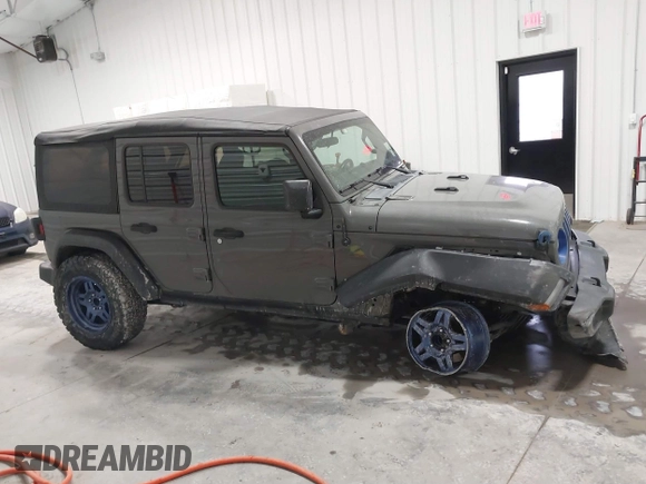 2020 Jeep Wrangler Unlimited Sport Altitude with VIN 1C4HJXDG7LW167909, listed as a IAAI auction lot 41413004 with 69,631 mi miles and . Bid and sale history available at DreamBid. Image 13.