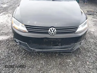 2014 Volkswagen Jetta TDI w/Premium with VIN 3VWLL7AJ1EM406360, listed as a IAAI auction lot 41857580 with 93,333 mi miles and . Bid and sale history available at DreamBid. Image 6.