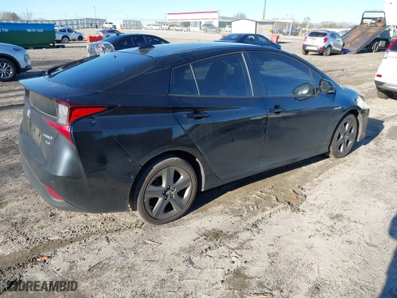 2019 Toyota Prius L Eco with VIN JTDKARFU9K3091887, listed as a IAAI auction lot 41282017 with 240,000 mi miles. Bid and sale history available at carsss.com. Image 4.