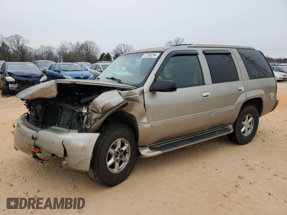 2000 Cadillac Escalade z VIN 1GYEK63R9YR218680, wystawiony jako Copart lot #87393204 z przebiegiem 295 494 mil mil oraz Szkoda całkowita • Salvage title. Historia ofert i sprzedaży dostępna na DreamBid. Obrazek 1.
