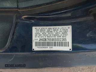 1999 Acura Integra LS z VIN JH4DB7659XS002365, wystawiony jako IAAI lot #42343805 z przebiegiem 122 081 mil mil oraz . Historia ofert i sprzedaży dostępna na DreamBid. Obrazek 9.