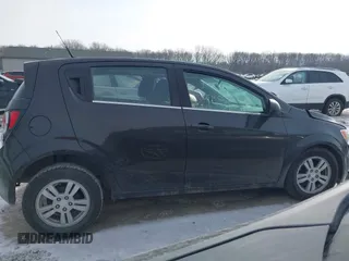 2014 Chevrolet Sonic LT with VIN 1G1JC6SB3E4219055, listed as a IAAI auction lot 41411713 with 76,047 mi miles. Bid and sale history available at carsss.com. Image 13.