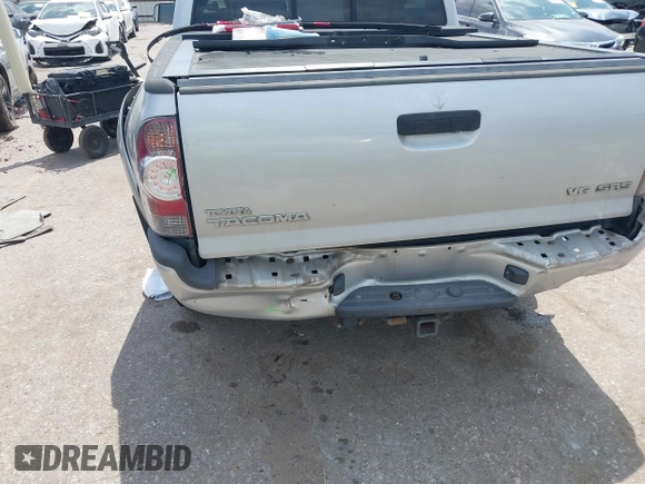 2009 Toyota Tacoma with VIN 3TMLU42N69M032320, listed as a IAAI auction lot 42280196 with 214,720 mi miles and . Bid and sale history available at DreamBid. Image 6.