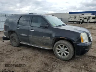2007 GMC Yukon Denali z VIN 1GKFK63837J141601, wystawiony jako Copart lot #55281655 z przebiegiem 285 633 mil mil oraz Tytuł czysty. Historia ofert i sprzedaży dostępna na DreamBid. Obrazek 4.