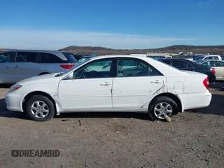 2003 Toyota Camry LE with VIN 4T1BE32K63U249910, listed as a IAAI auction lot 41719507 with 125,168 mi miles and . Bid and sale history available at DreamBid. Image 14.